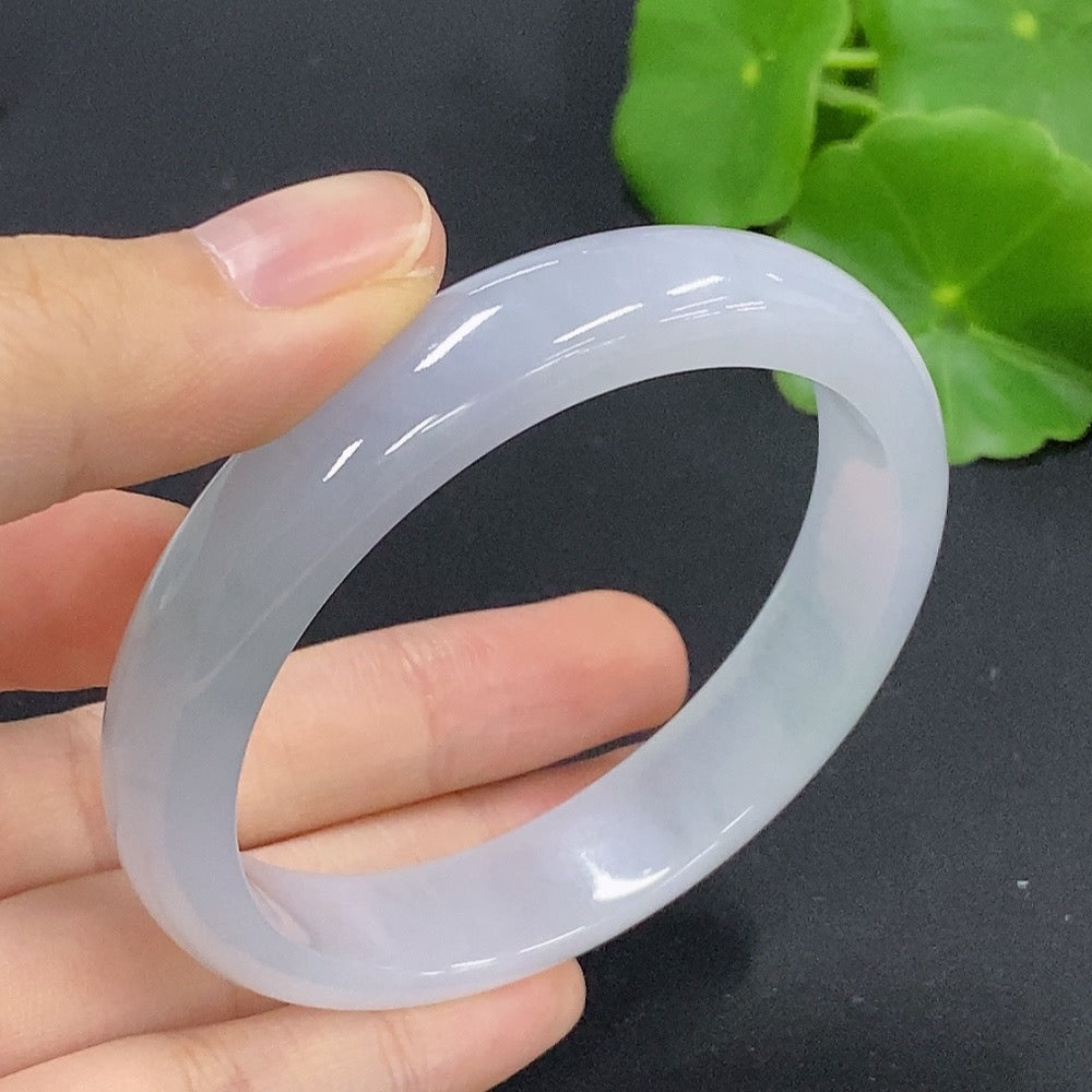 HKHQ jadeite round bangle, size 54.8, weighing 42.3g, polished green jade bracelet with smooth, rounded design.