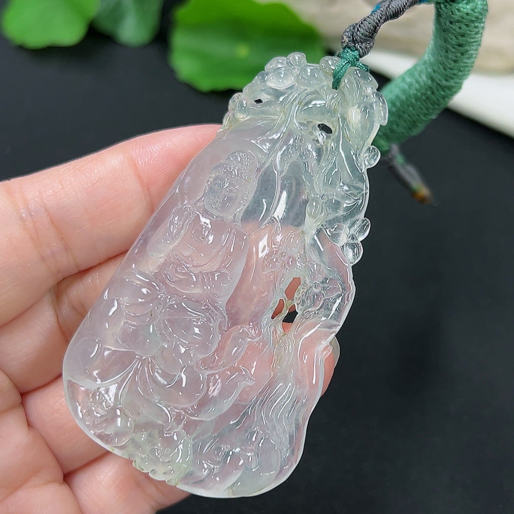 Jadeite Guanyin pendant with cord, crafted from green jade, weighing approximately 27.4g, featuring detailed religious iconography.