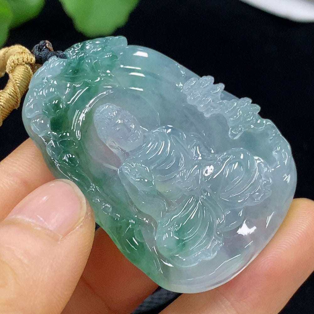 Jadeite Buddha pendant with a carved Buddha figure on a jade necklace, weighing approximately 26 grams, by HUILIU HQ.