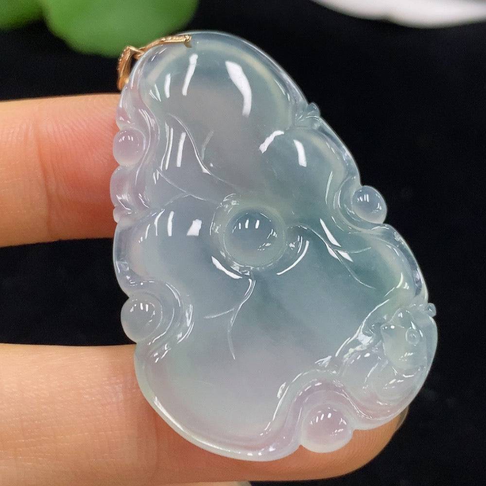 Jadeite lotus pendant by HUILIU HQ featuring an 18k gold setting, showcasing a detailed green jade lotus flower design.