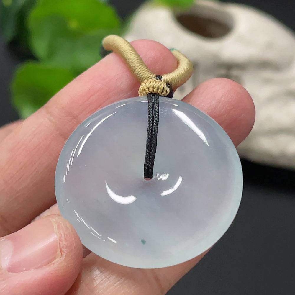 Jadeite pendant with peace buckle design, weighing approximately 14g including rope, from HUILIU HQ featuring smooth green jade.