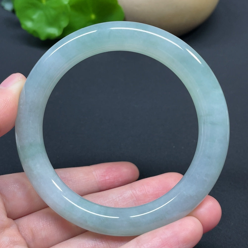 HKHQ jadeite round bangle in size 56.8 with a weight of 53.94g, showcasing smooth, polished jadeite craftsmanship.