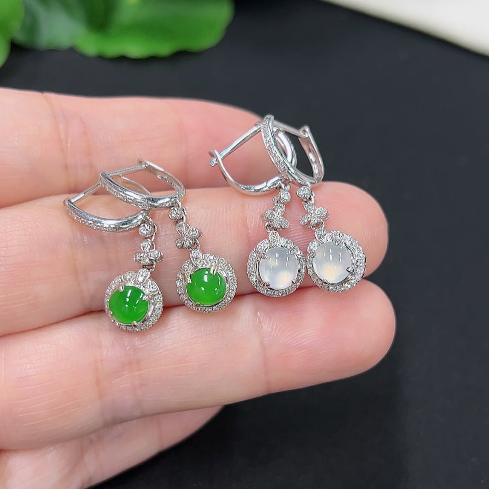 Jadeite inlaid earrings with 18K gold and diamond accents, featuring intricate design and elegant craftsmanship.