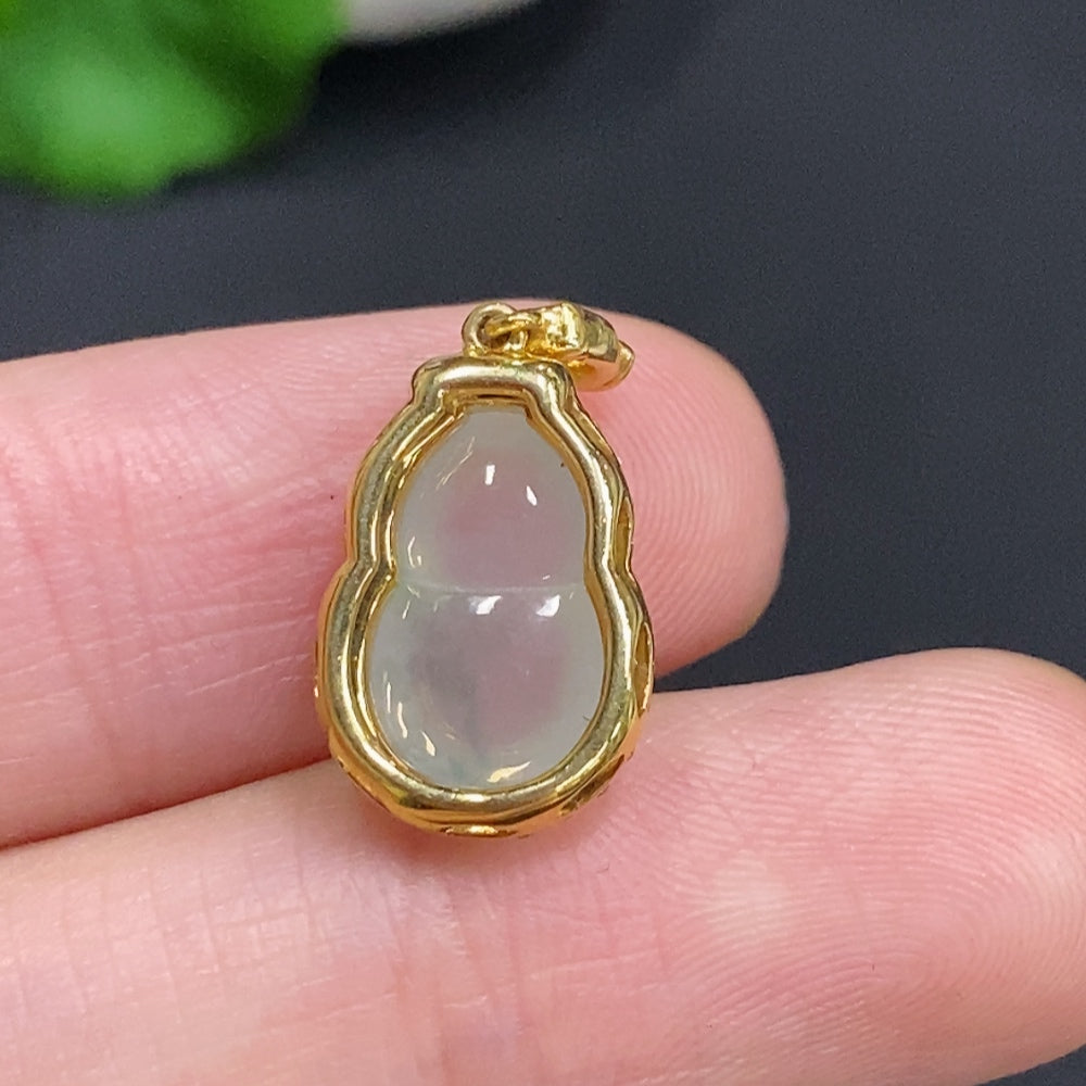 Huiliu Jadeite gourd pendant with diamond inlays, featuring intricate craftsmanship and vibrant green jade coloration.