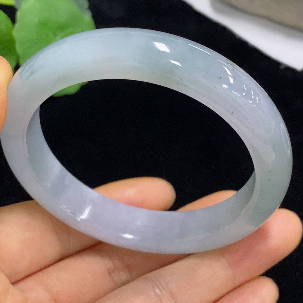 Jadeite round bracelet with size 56, weighing approximately 56g from HUILIU HQ, featuring smooth, polished jade beads.