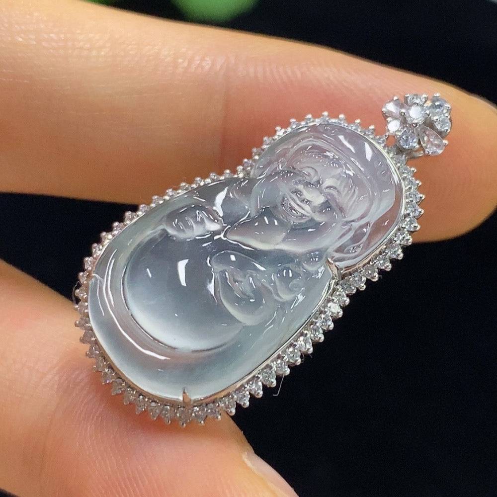 Jadeite Maitreya pendant with inlaid diamonds, 18k gold, shown with intricate design and polished finish, weight approx. 4.6g.