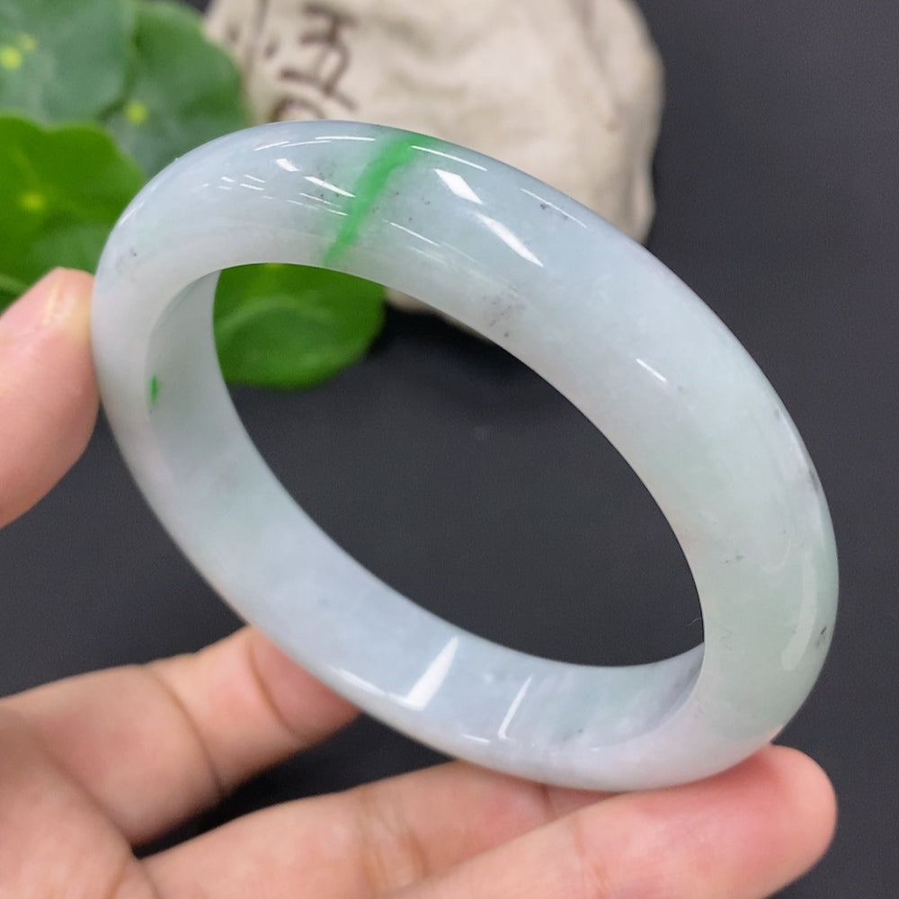 Jadeite round bracelet by HKHQ featuring smooth jade beads, size 58.2, weighing approximately 64.1 grams, natural and polished.