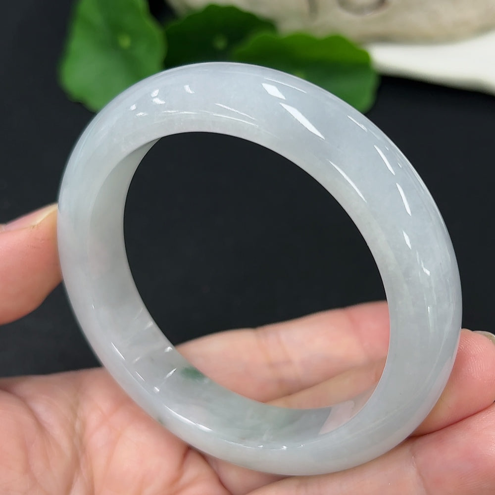 HKHQ jadeite round bangle in size 54.6 with approx. 59.5g weight, showcasing smooth, polished jade surface.