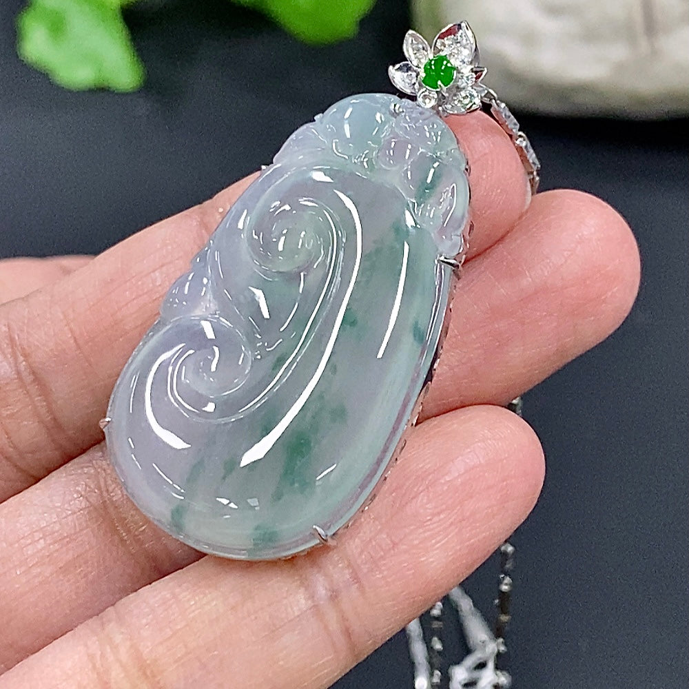 Jadeite Ruyi pendant with 18k gold chain, diamonds, and HKHQ branding, weighing 12.3g, showcasing intricate design and craftsmanship.