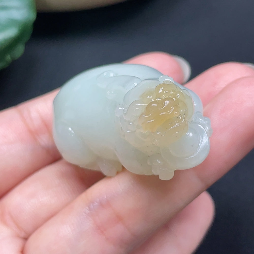 Hetian jade Pixiu pendant by HKHQ, featuring a detailed carved jade figure, weighing approximately 73.49 grams.