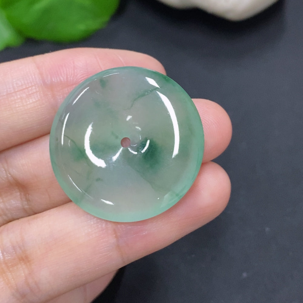 Jadeite safety buckle jewelry by HKHQ featuring a smooth, polished jadeite clasp with intricate design details.