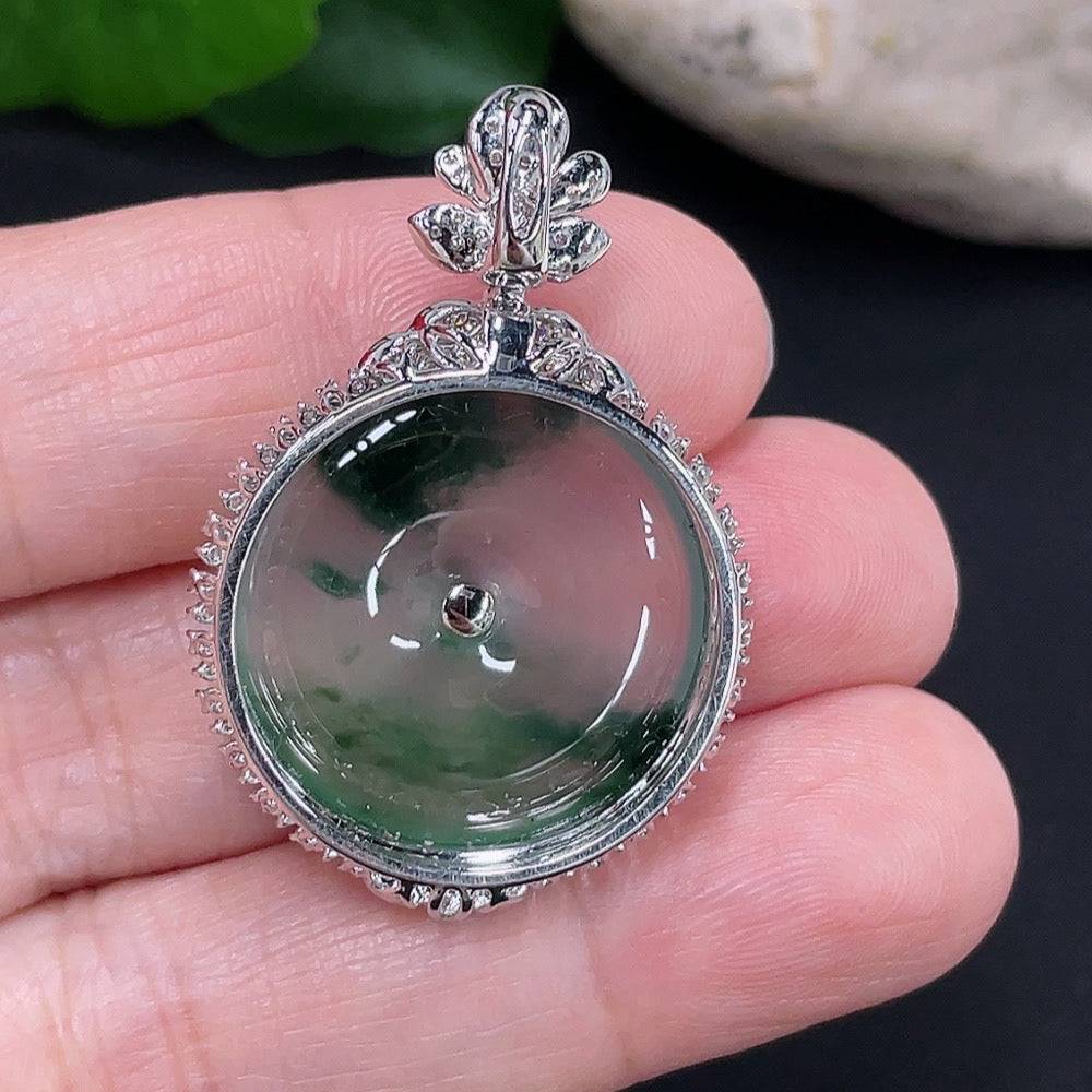 Jadeite peace knot pendant by HUILIU HQ with 18K gold accents and diamond details, showcasing intricate craftsmanship.