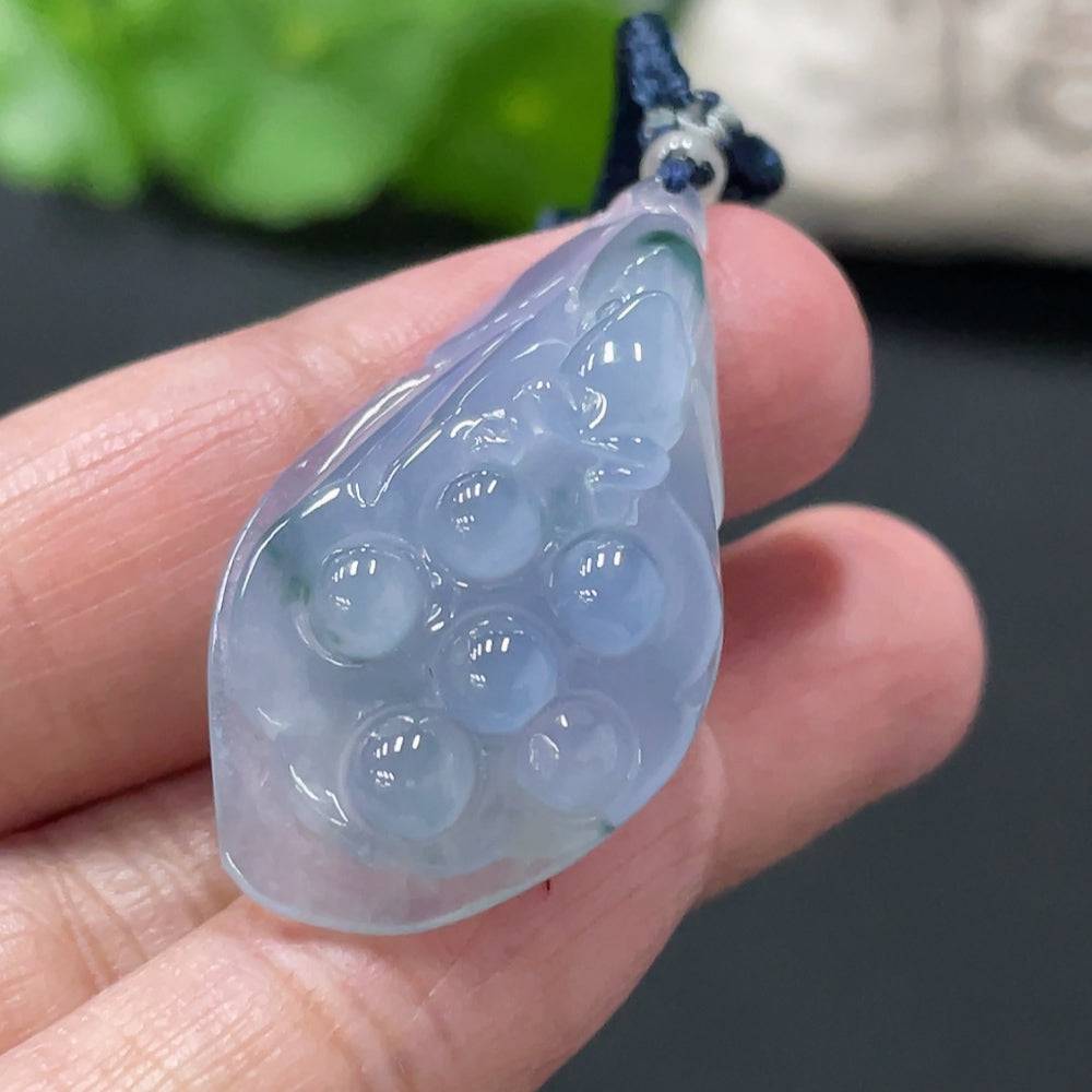 Jadeite Lotus Pod Pendant in green jade, crafted by HUILIU HQ, weighing approximately 9.33 grams, showcasing detailed lotus design.