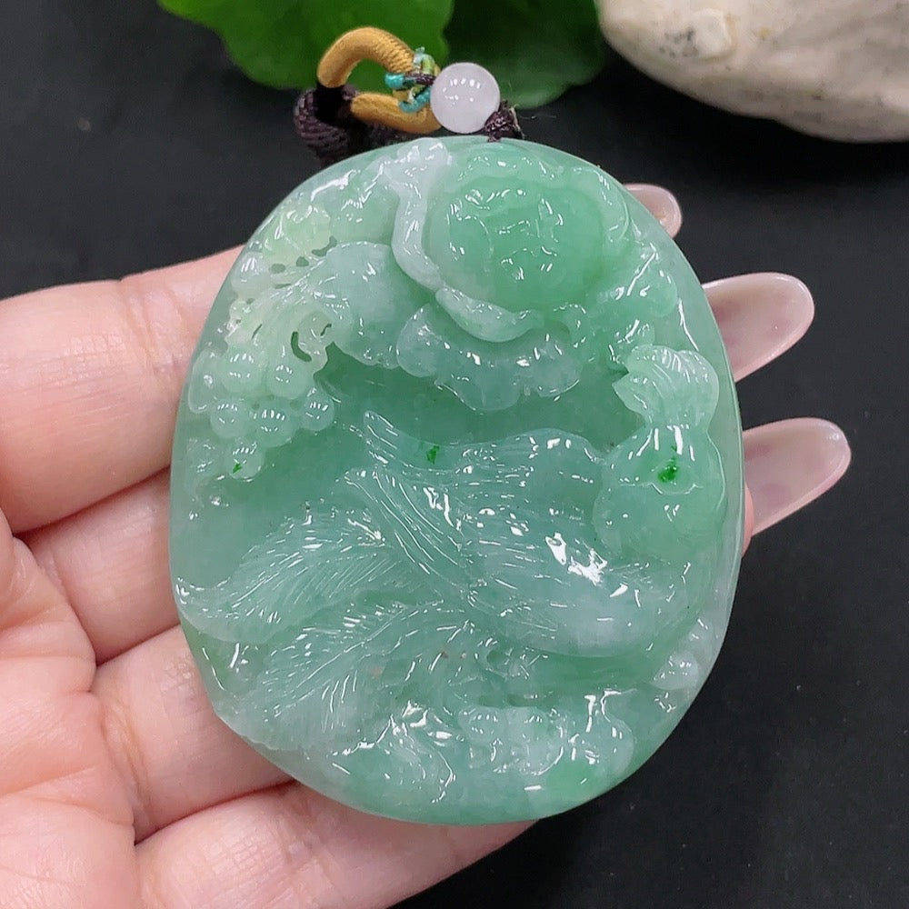 Huiliu Jadeite Phoenix and Peony pendant featuring intricate carved green jade design with detailed phoenix and peony motifs.