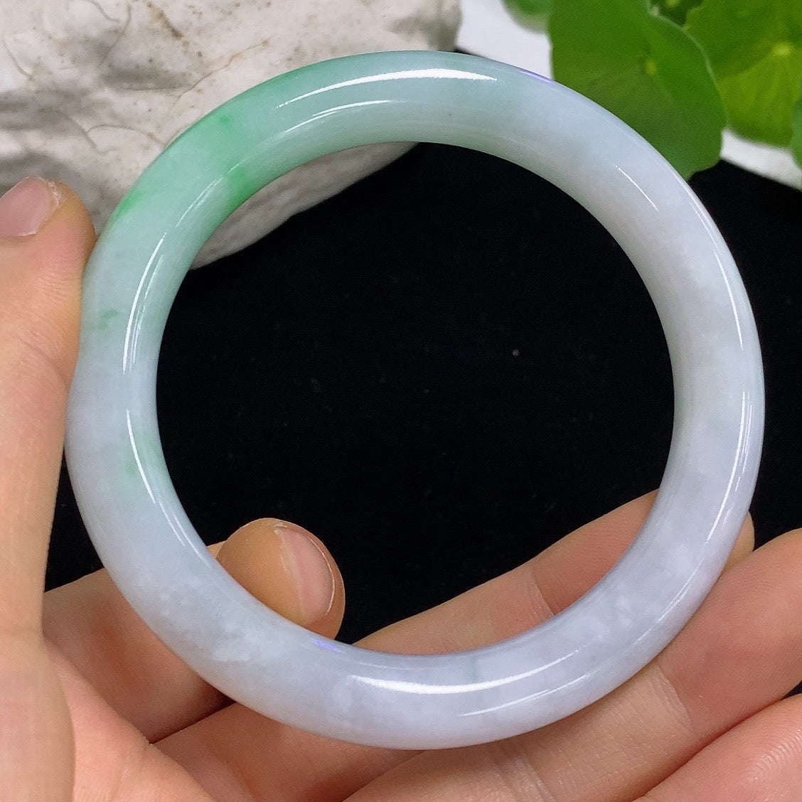 HKHQ jadeite round bangle, size 55, weight 51.42g, showing smooth green jade surface and classic circular design.