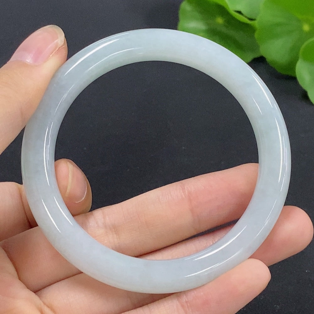 HKHQ jadeite round bangle size 52, smooth polished jade with a total weight of 35.12g, showcasing a glossy green finish.