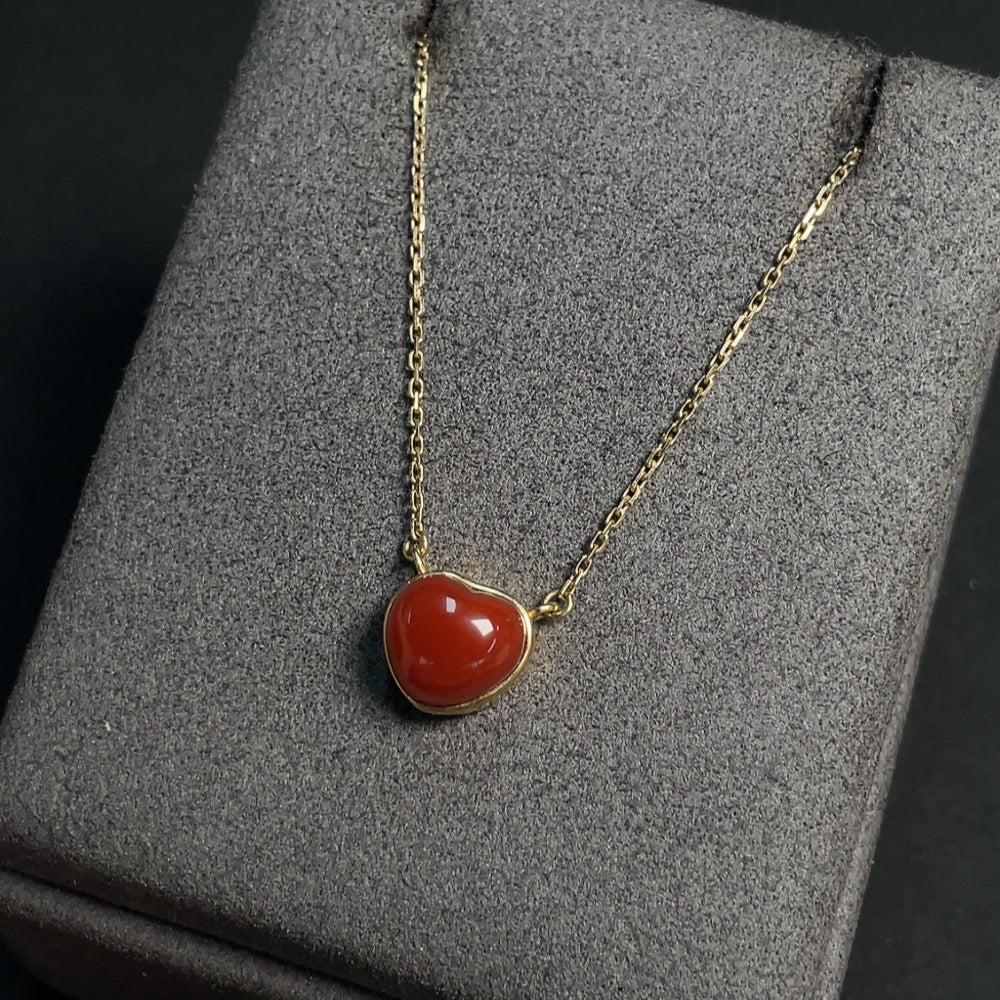 Red Agate inlaid gemstone necklace with 18K gold chain, featuring organic matter details and weighing approximately 3.13g.