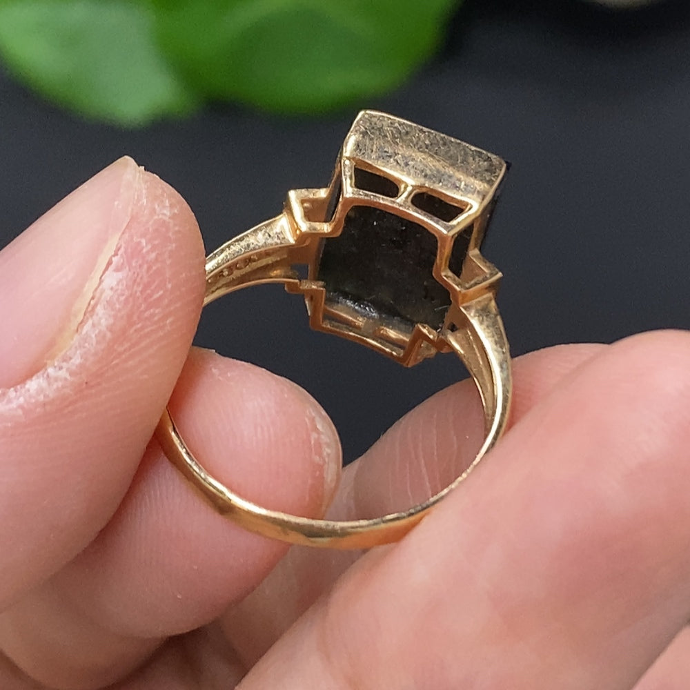 Jadeite ring with diamond accents in 18K gold, size 14, weighing approximately 3.4g, featuring a smooth, polished finish.