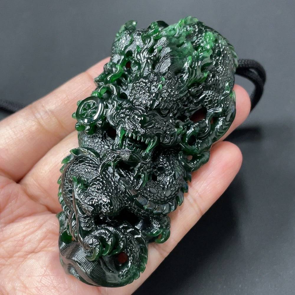 Huiliu certified jadeite dragon pendant featuring intricate dragon design and smooth polished surface.