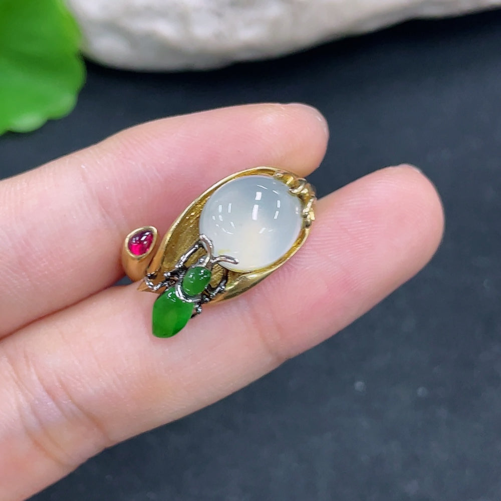 Elegant Jadeite ring with 18k gold setting, size 14, weighing approximately 9.5g, showcasing a smooth, polished jade gemstone.