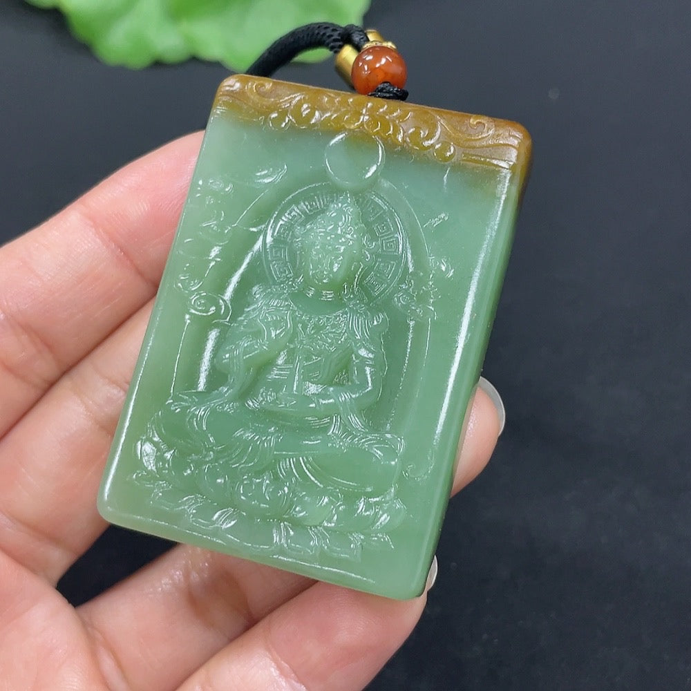Huiliu certified Hetian jade Guanyin pendant featuring intricate carved details and a smooth polished surface.