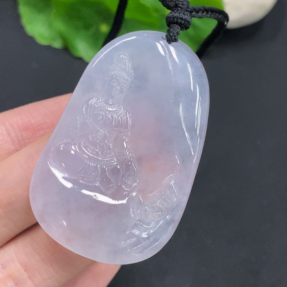 Jadeite Guanyin pendant with intricate carvings, weighing approximately 25.3g, featuring a jade HUILIU HQ brand pendant on a rope.