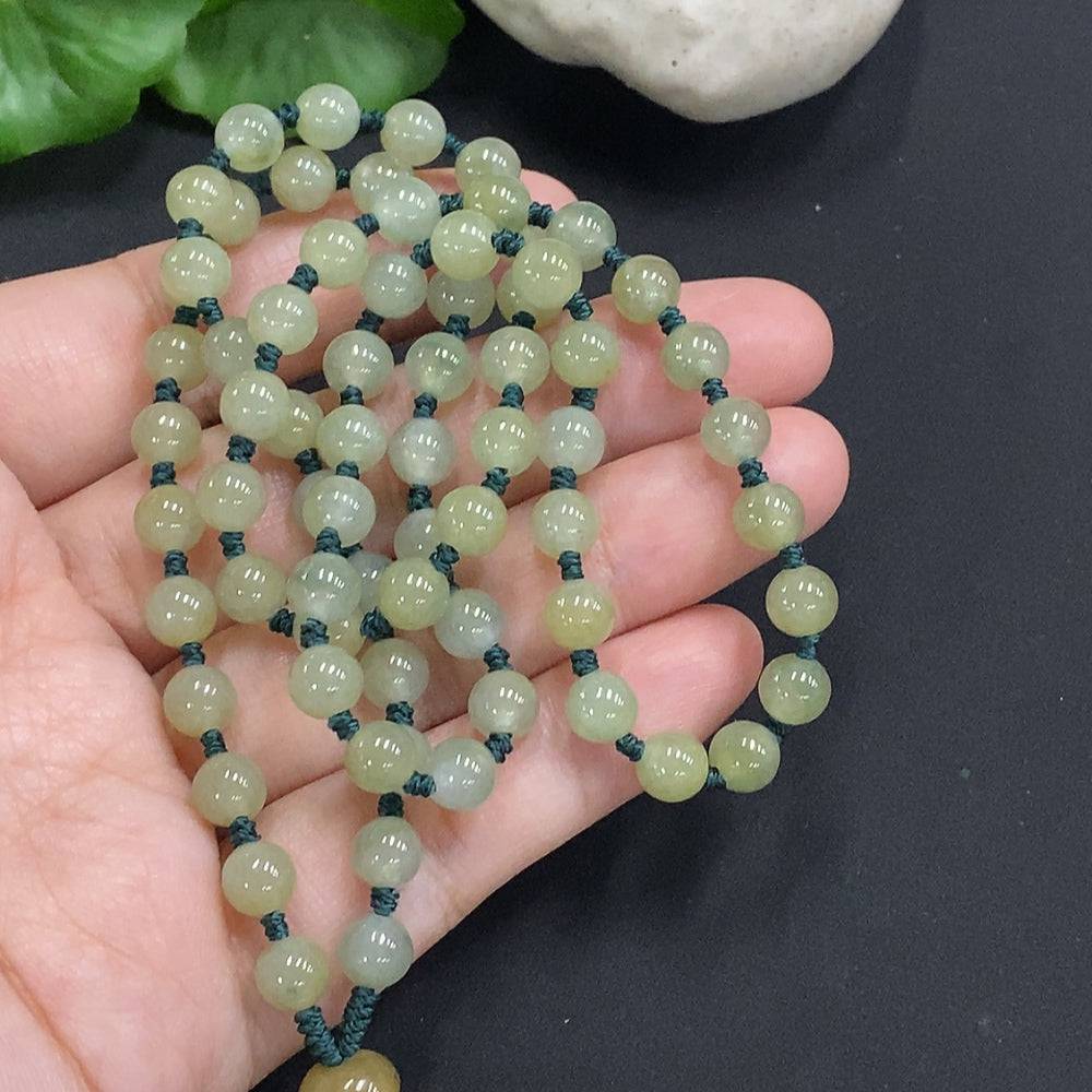 Huiliu Jadeite Flower of Wealth and Honor pendant with chain, featuring intricate jade flower design, certified by HUILIU HQ.