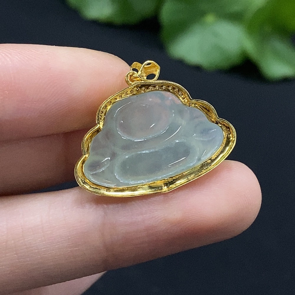 Huiliu Jadeite Buddha pendant inlaid with diamonds, featuring intricate craftsmanship and a polished jade surface.