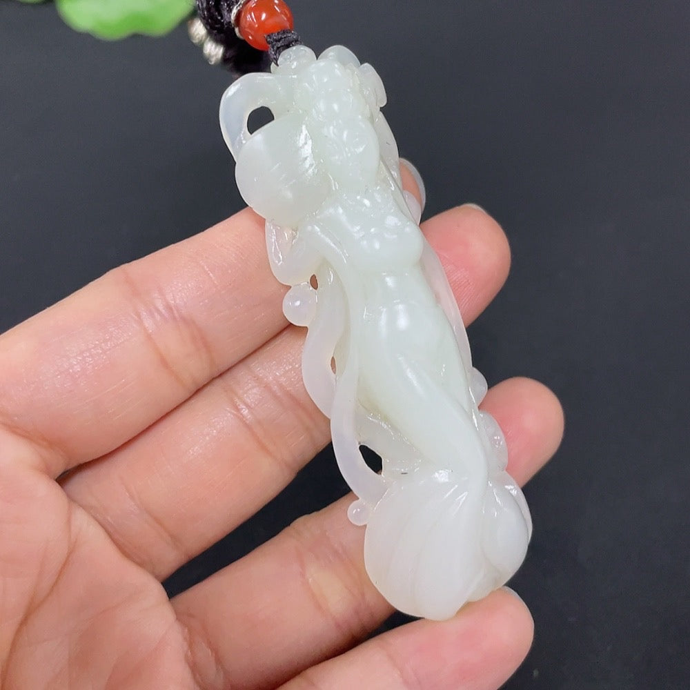 Huiliu Certified Hetian Jade Pendant featuring a fairy design, showcasing smooth, polished green jade craftsmanship.