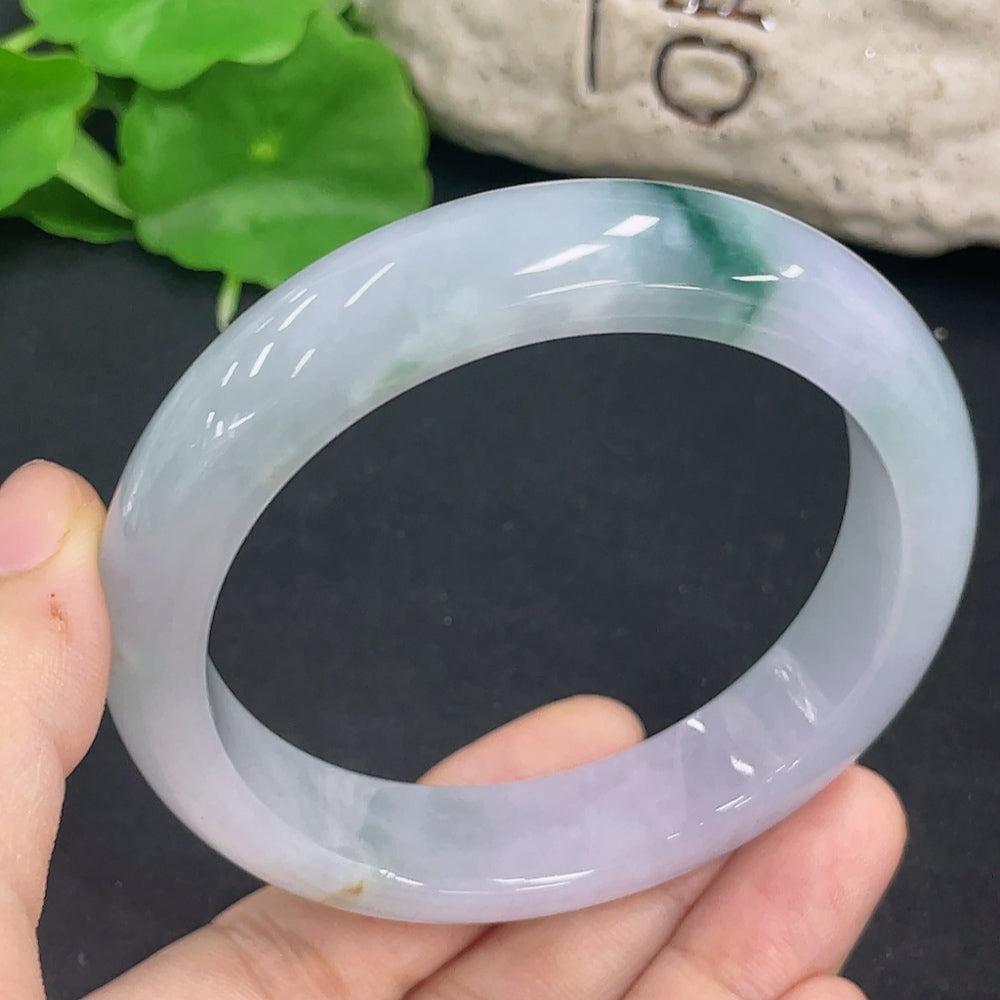 HKHQ jadeite round bangle in size 59.3 with a smooth, polished surface and a weight of 69.5g, showcasing elegant craftsmanship.