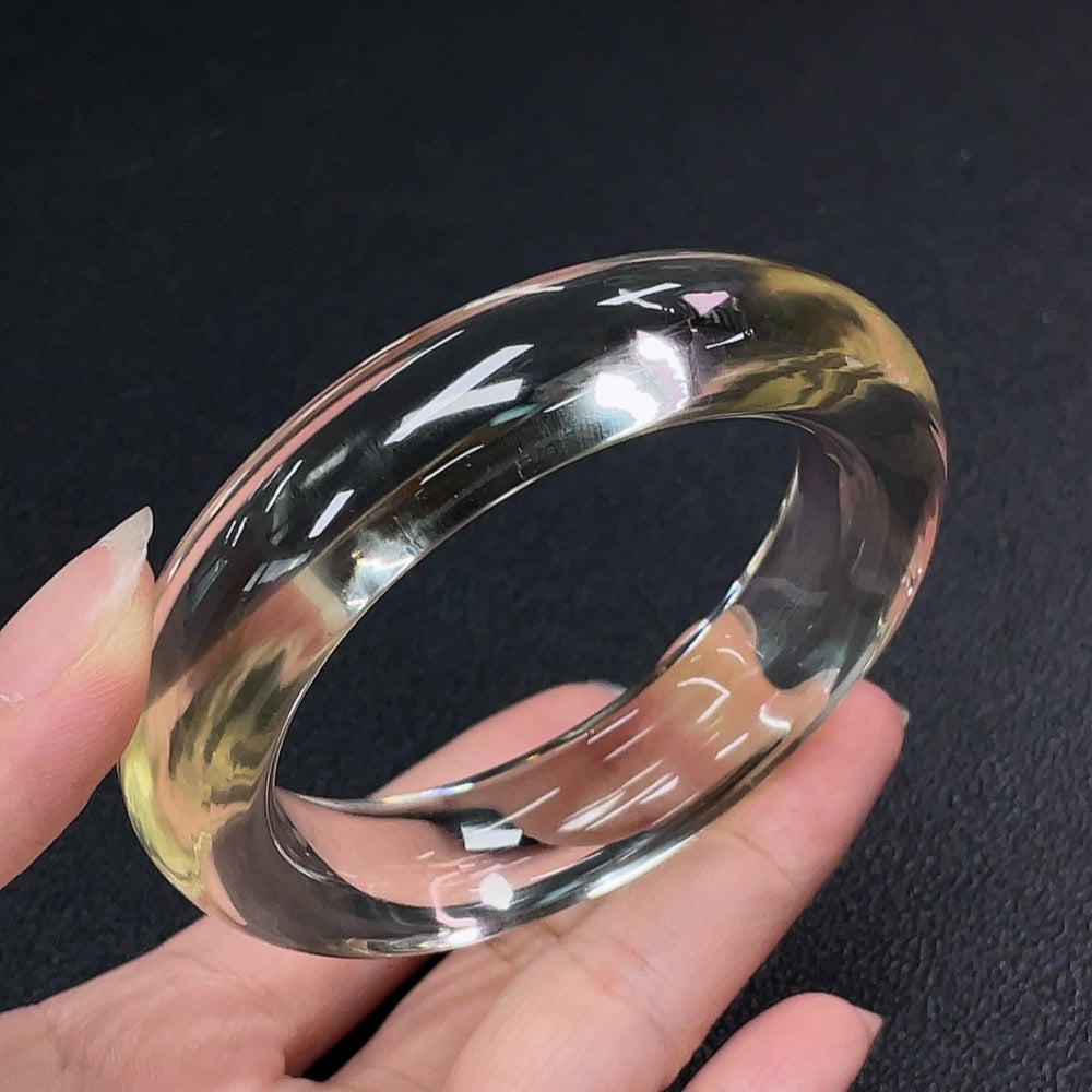 Huiliu Certified Crystal Gemstone Bracelet with multicolored beads, elegant jewelry accessory on a neutral background.