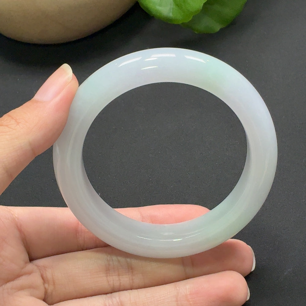 Jadeite round bracelet with size 54.3 and weight 68.93g, featuring smooth, polished jade beads on a HKHQ bracelet.