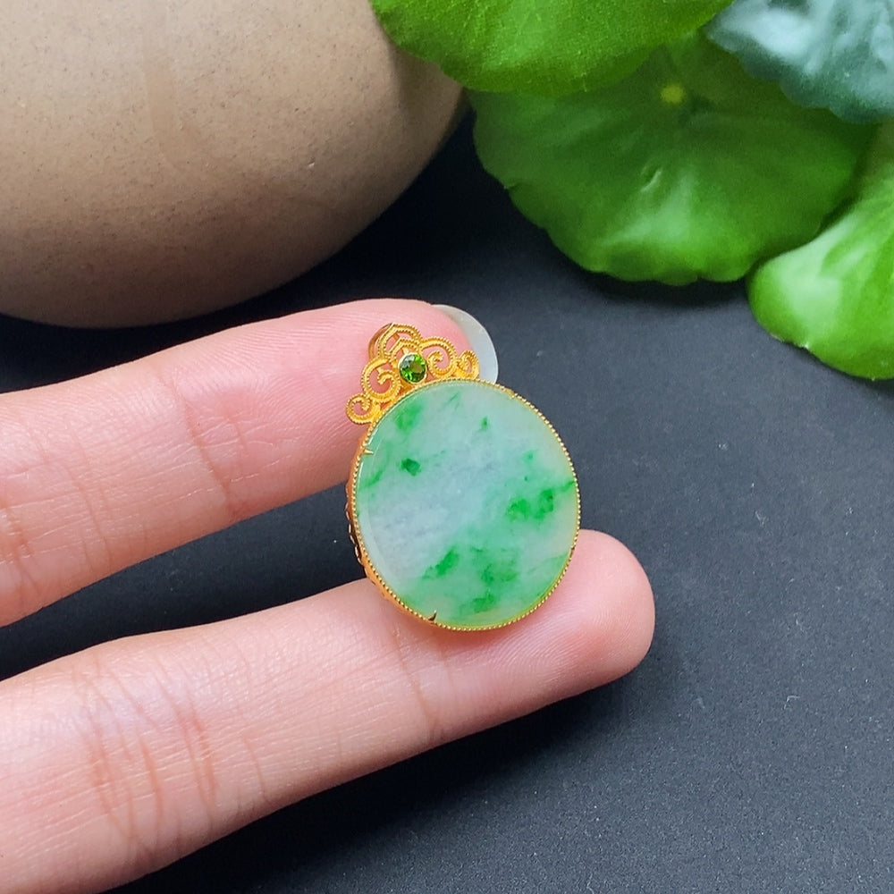 Jadeite plain pendant in 18K gold necklace, featuring a smooth, polished jadeite stone with a simple gold setting.