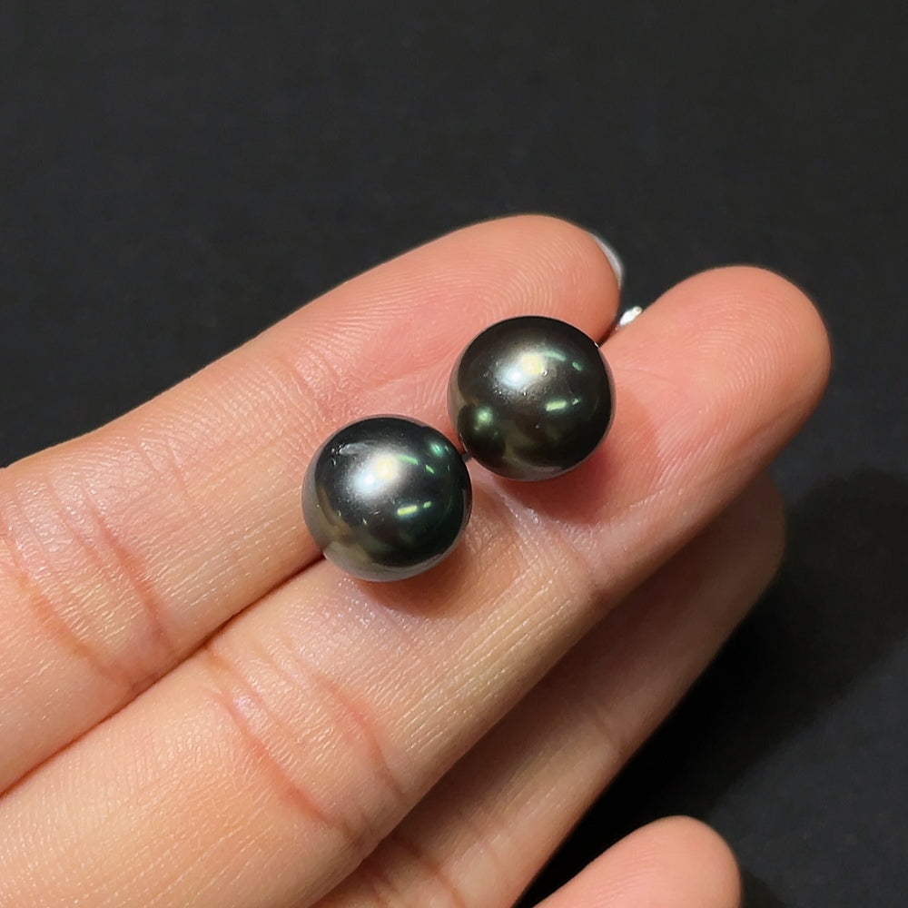 Seawater pearl earrings with 18K gold and diamond accents, featuring 10.6mm pearls, designed by HKHQ.