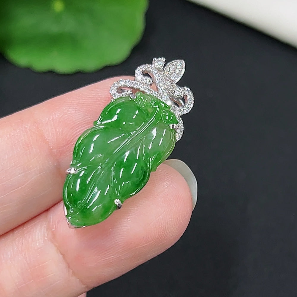 Jadeite leaf inlay pendant with diamond accents in 18K gold, crafted by HKHQ, weighing approximately 3.5 grams.
