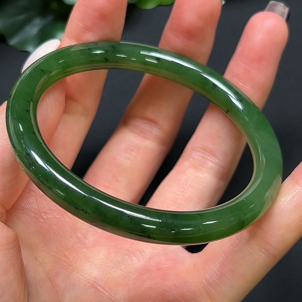 Hetian jade round bangle with 56.7mm diameter and 29.59g weight, featuring smooth, polished green jade from HKHQ.