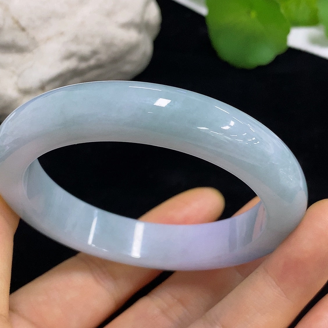 Jadeite round bracelet in size 56 with approximately 61.72g weight, featuring smooth, polished jadeite beads on a HKHQ bracelet.