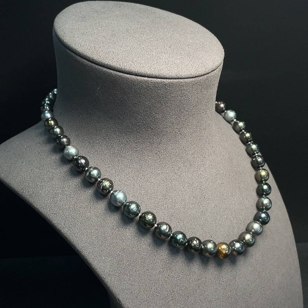 HUILIU HQ seawater pearl strand with 9.4mm non-blemished pearls, certified by Huiliu, showcasing a lustrous, elegant necklace.