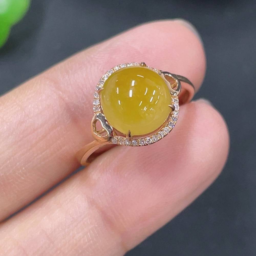 Jadeite cabochon ring with diamond accents in 18k gold setting, size 12.5, by HUILIU HQ, featuring a smooth green jade stone.