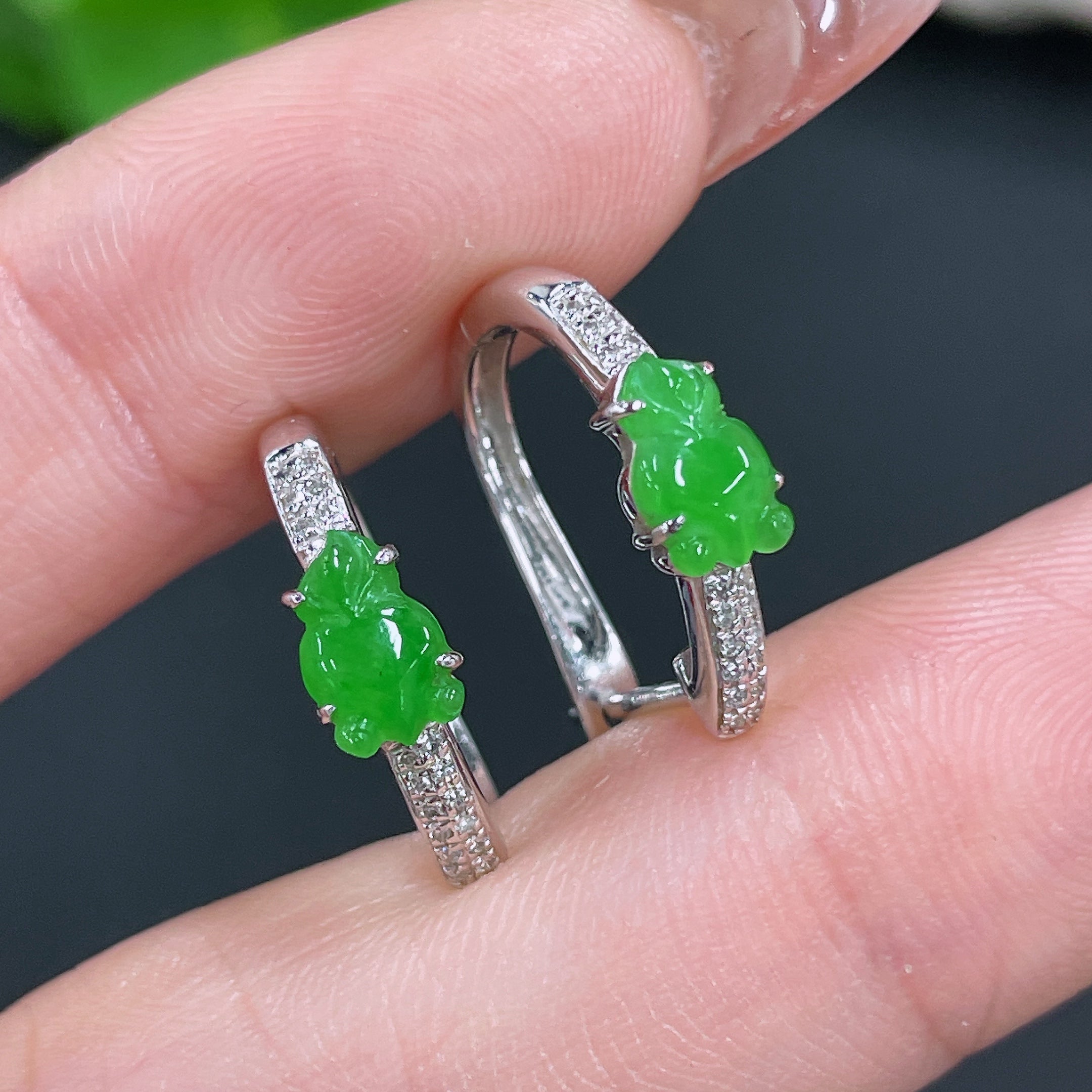 Jadeite earrings set in 18k gold with diamond accents, lightweight jewelry with elegant green jade stones and sparkling diamonds.