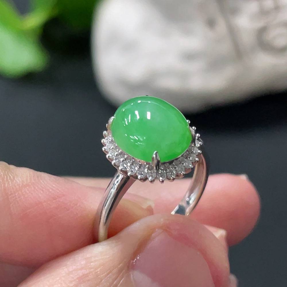 Huiliu HQ jadeite cabochon ring with diamond accents, featuring a polished green jade stone on a silver band.