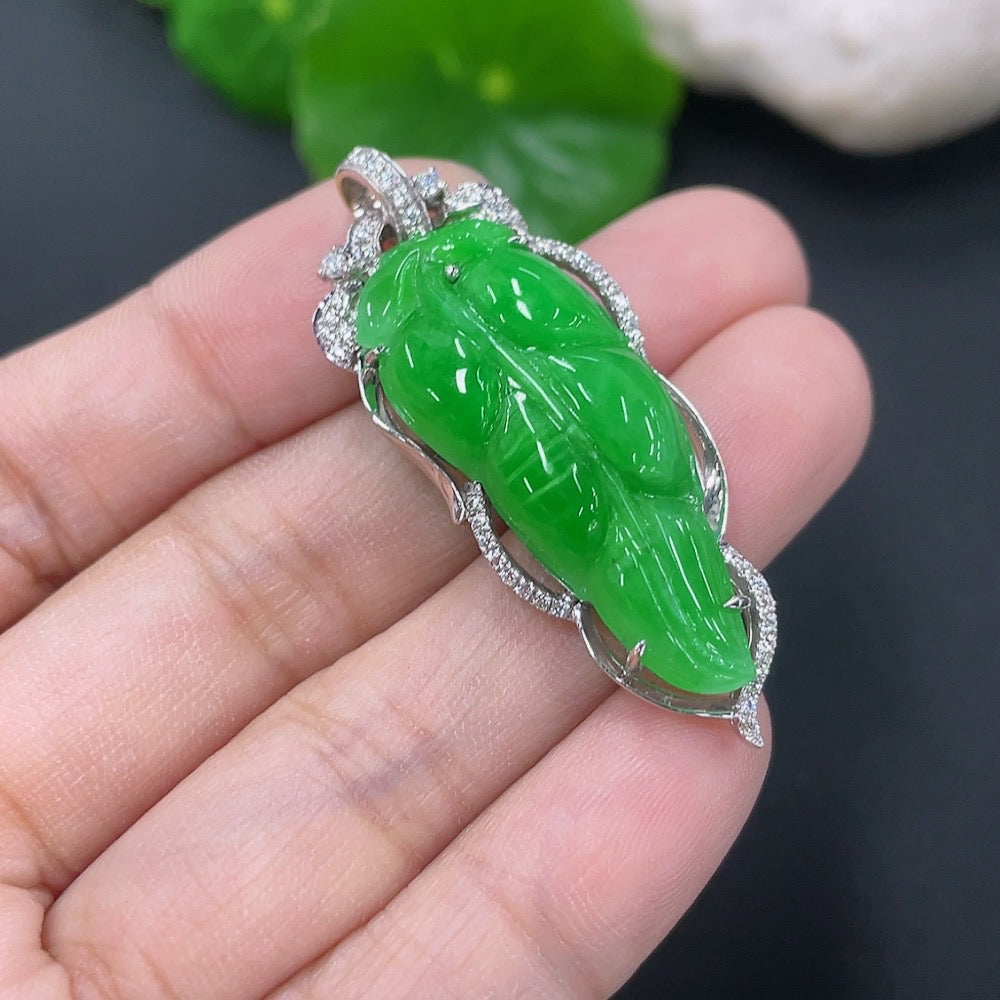 Jadeite leaf pendant necklace with mixed gold components from HKHQ, featuring a natural green jadeite leaf design.