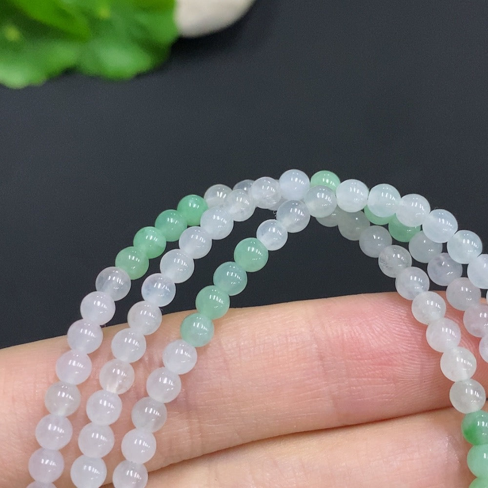 Jadeite bead necklace with 3.7mm jade beads, non-gold inlay, weighing approx. 18.5g, featuring smooth, round jade stones.