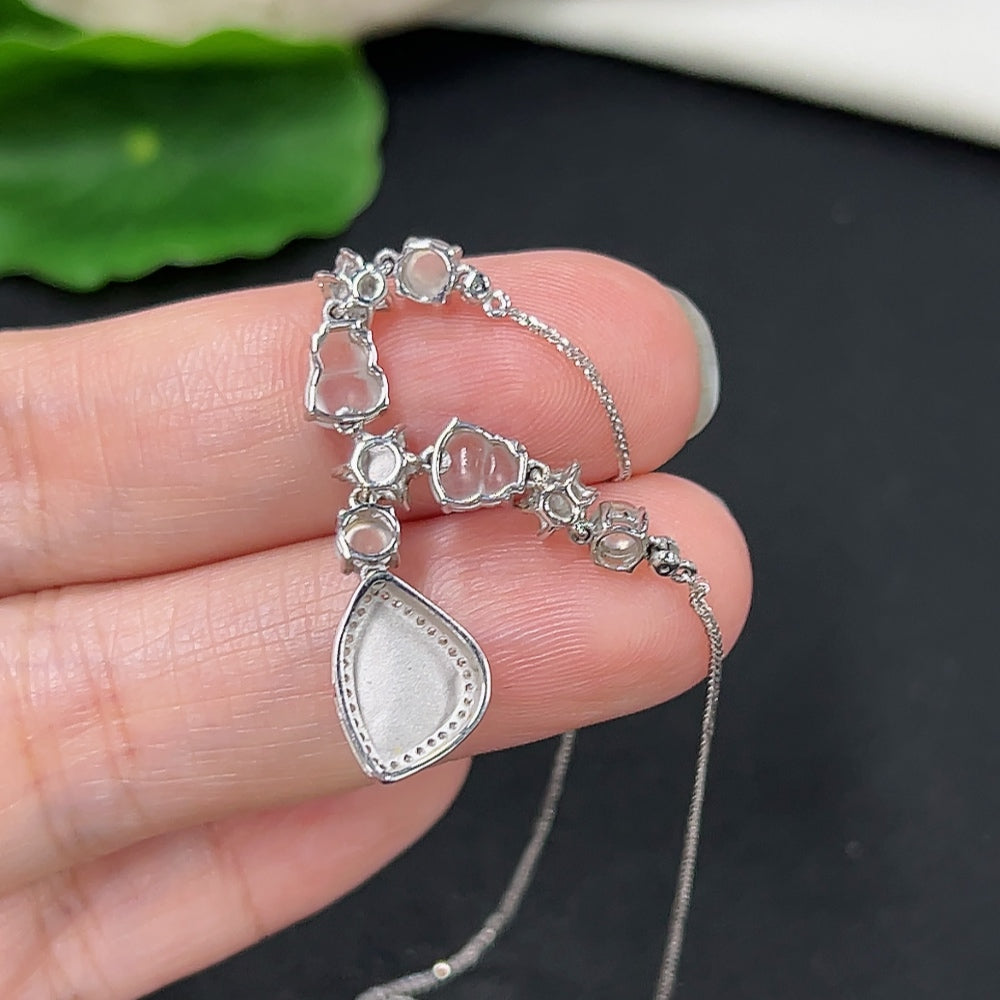 Elegant Jadeite necklace in 18K gold with diamond accents, featuring a delicate jade pendant and a sleek chain.