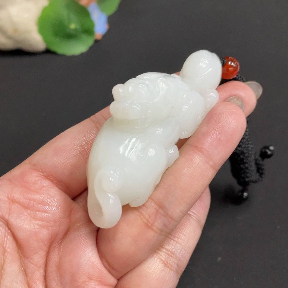 Hetian jade pendant featuring an auspicious beast design with non-Hetian jade beads, weighing approximately 65.3g with rope.