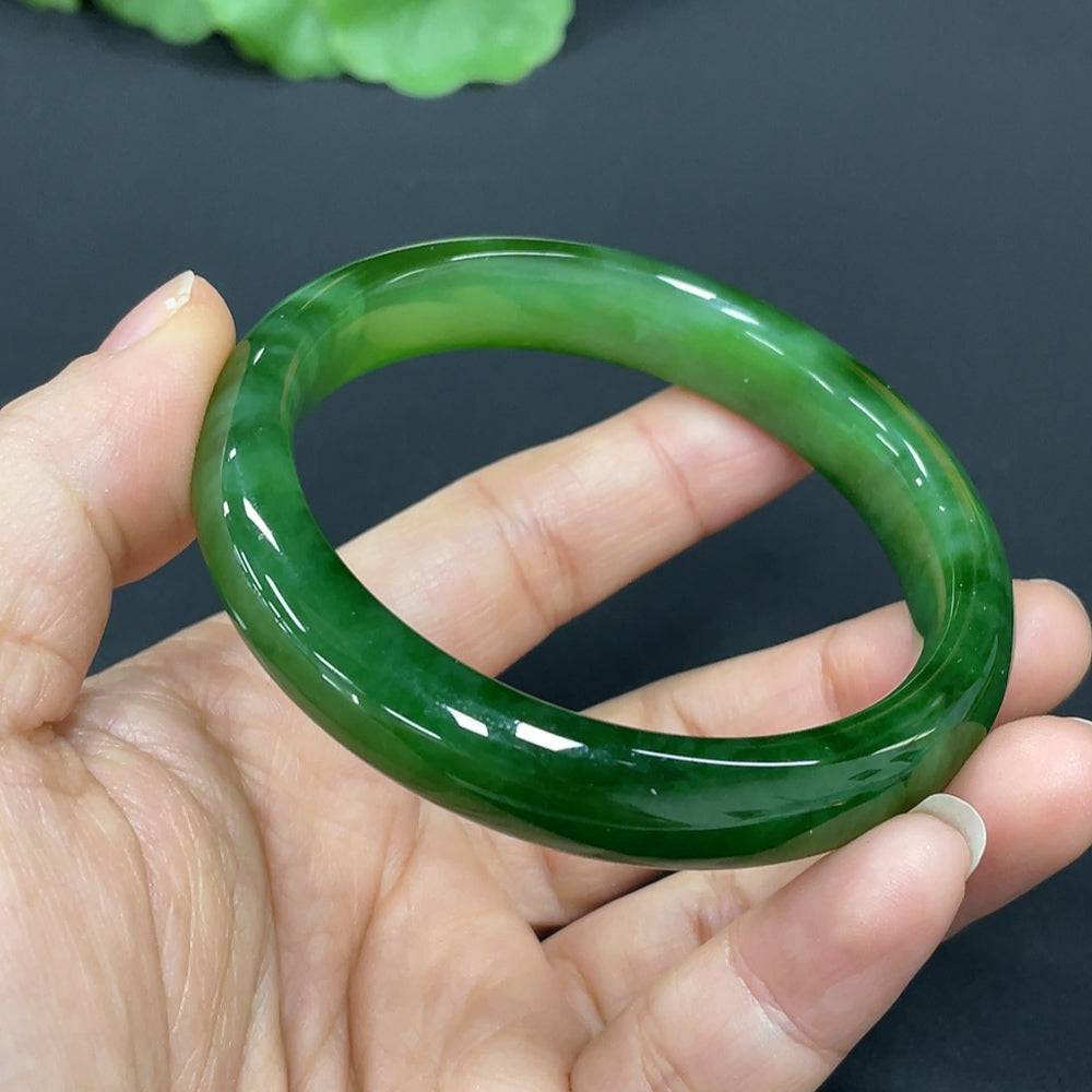 Huiliu certified Hetian jade round bracelet featuring smooth, polished jade beads on a delicate string.