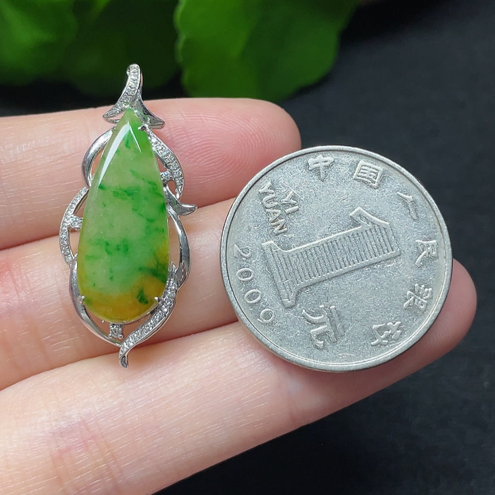Jadeite teardrop pendant with 18K gold and diamond accents, elegant necklace showcasing lush green jadeite and sparkling details.