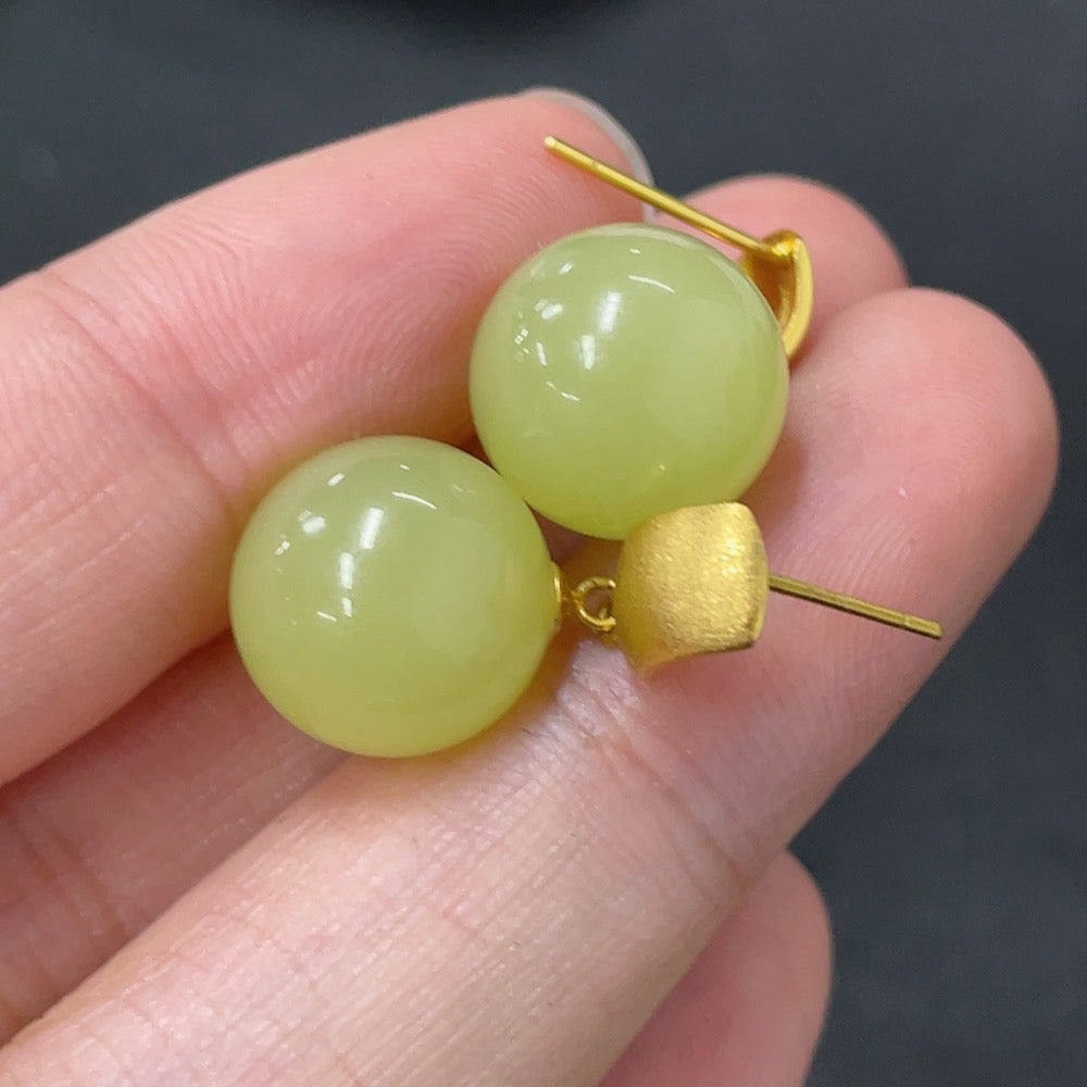 Hetian Jade inlaid earrings with 18K gold setting, approximately 11.8mm in size, crafted by HUILIU HQ.