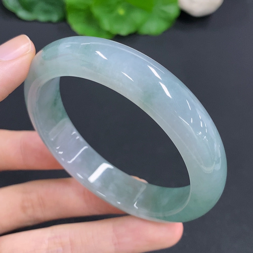 Jadeite round bracelet by HKHQ, approximately 56.4g, featuring smooth green jade beads and a secure clasp.