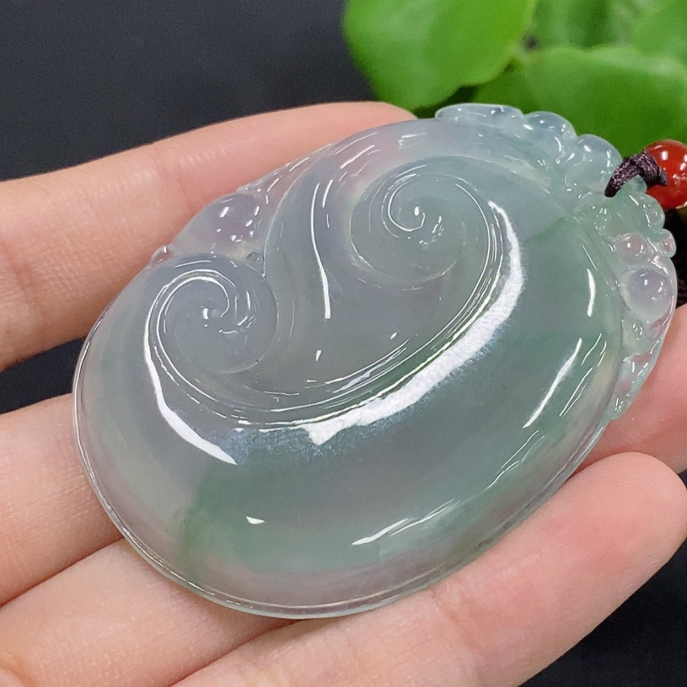 Jadeite Ruyi pendant necklace by HKHQ featuring a smooth, polished jadeite pendant with intricate Ruyi design on a delicate chain